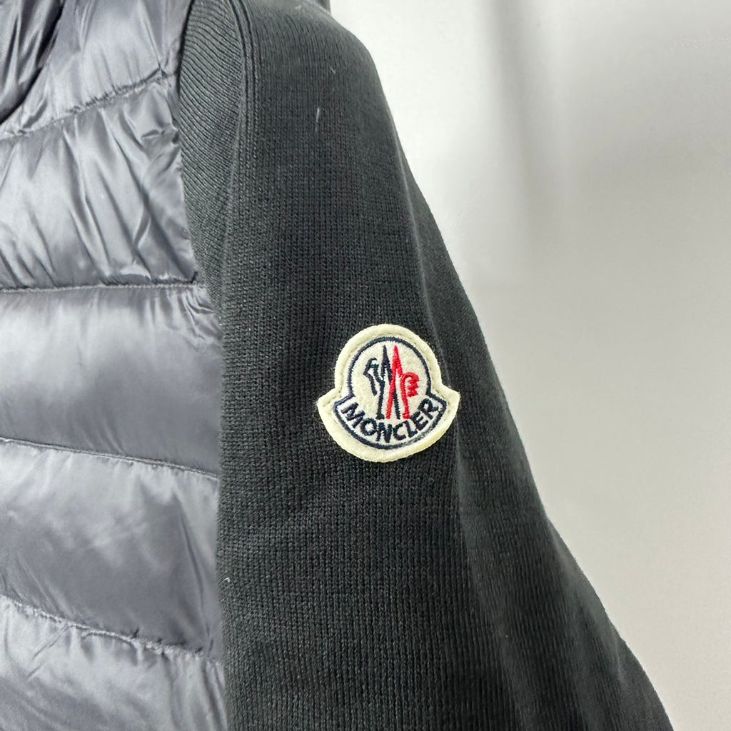 Moncler long puffer jacket sleeve patch logo on dark knit cuff