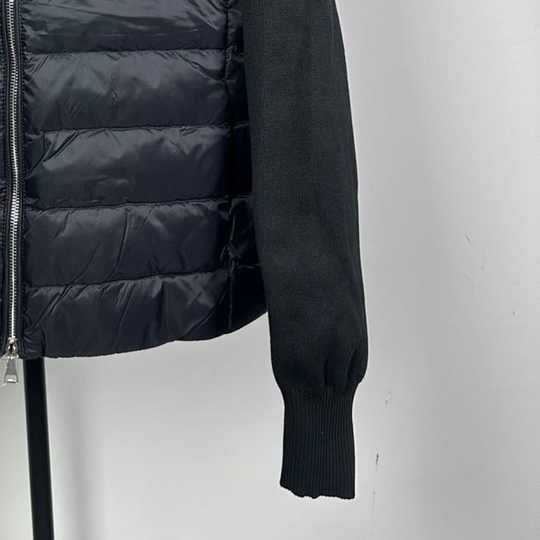 Moncler long puffer jacket sleeve, ribbed cuff, dark quilted fabric