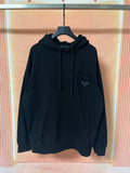 Prada dark hoodie with hood, drawstrings, and front kangaroo pocket
