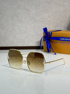 Louis Vuitton sunglasses with beige monogram frames and light gradient lenses