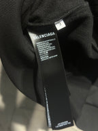 Black Balenciaga hoodie fabric tag at inner collar
