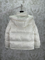 White long puffer jacket with attached hood and padded back