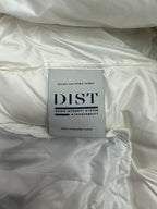 White puffer jacket fabric with DIST down certification label