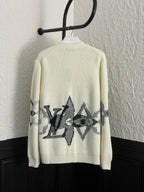 Cream rib-knit cardigan back with black geometric star graphic panel