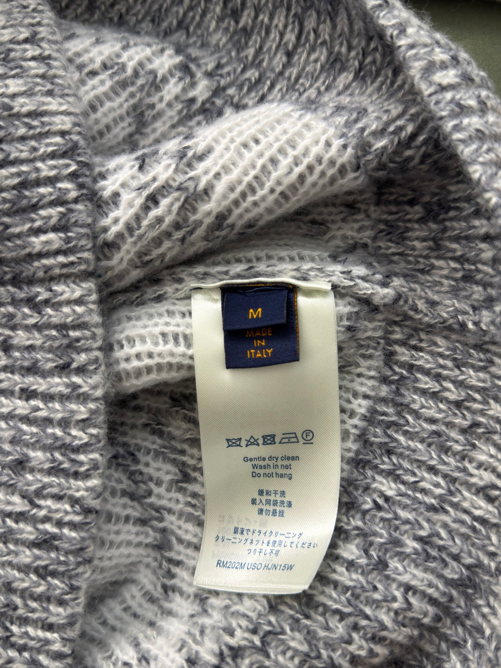 Louis Vuitton knit sweater with size and care label at the inner collar