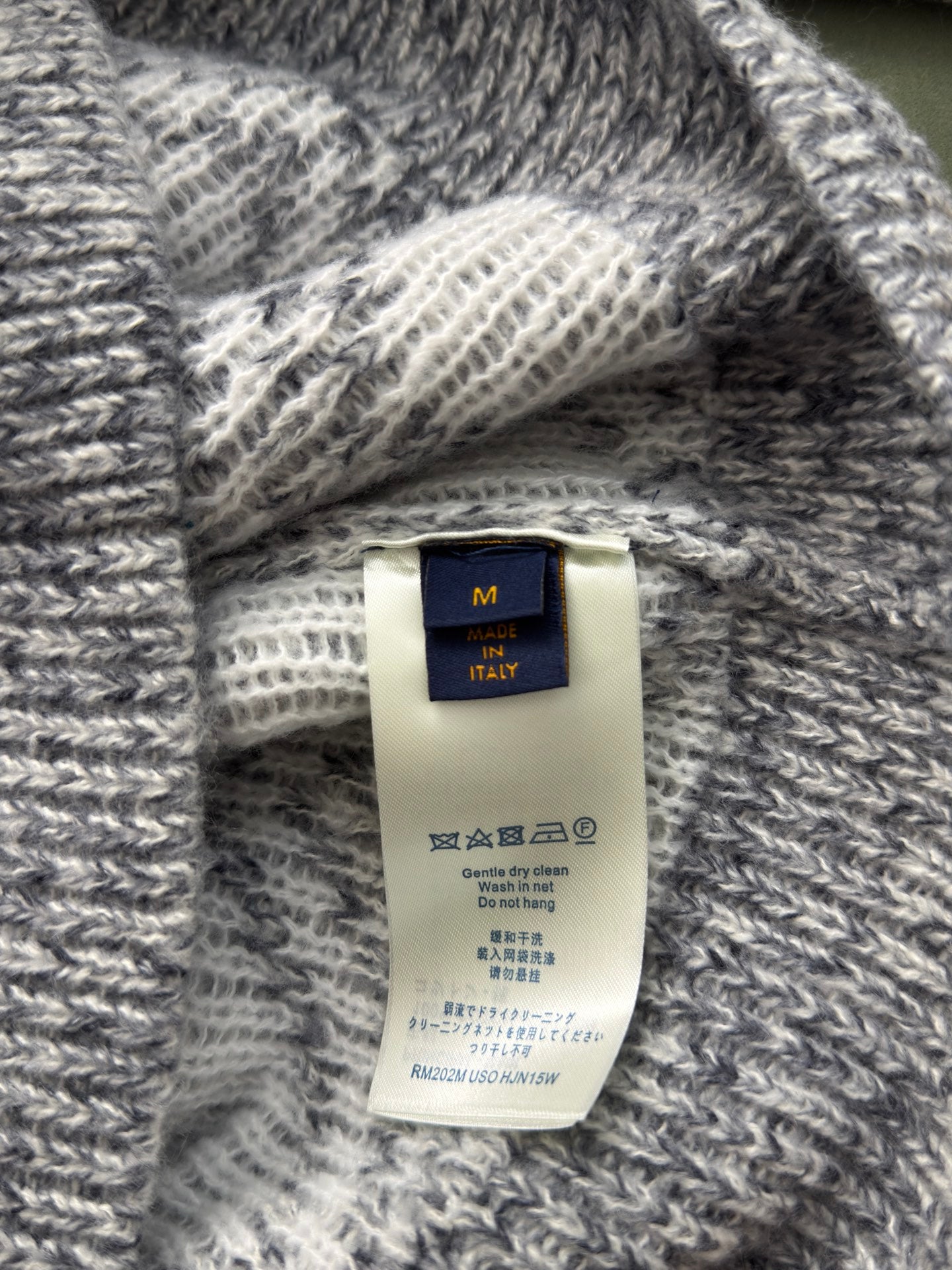 Louis Vuitton knit sweater with size and care label at the inner collar