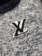 Louis Vuitton knitted sweater with black LV emblem on the chest
