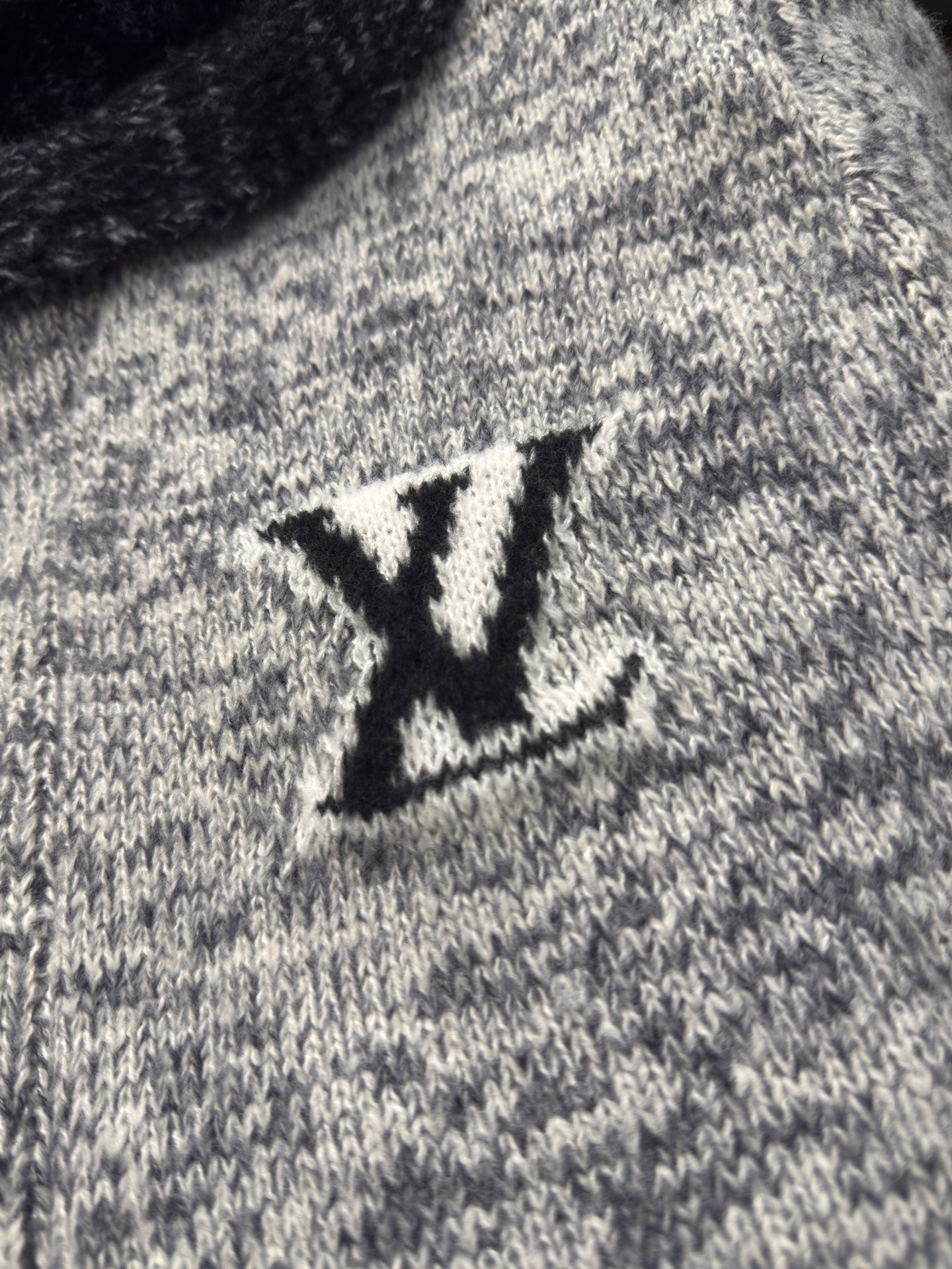 Louis Vuitton knitted sweater with black LV emblem on the chest