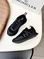 Moncler black sneakers with chunky sole and lace-up side stripes