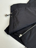 Prada jacket close-up of adjustable drawcord and zipper seam on sleeve