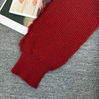 Burgundy ribbed knit sleeve cuff with soft frayed trim
