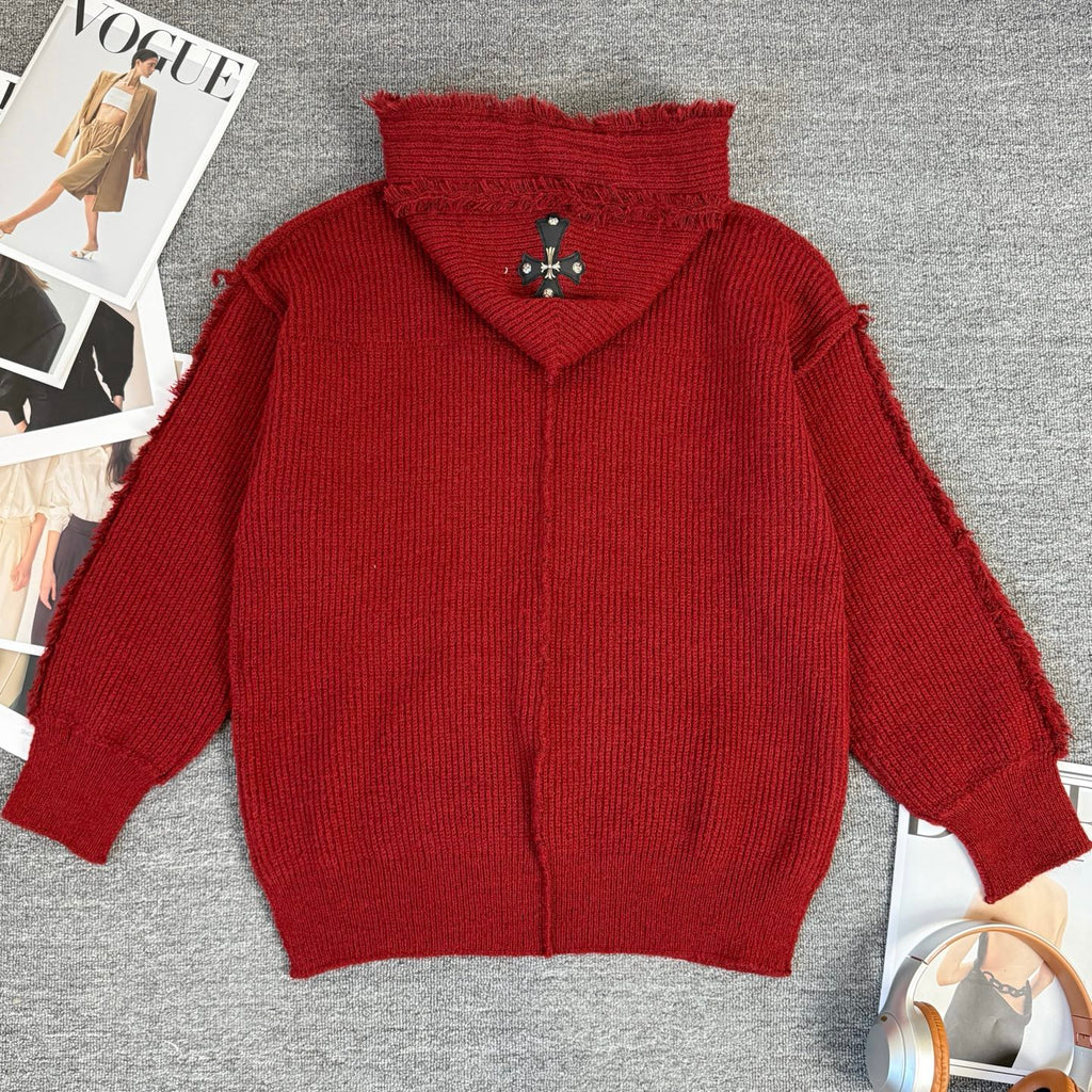 Burgundy knit hoodie with oversized hood and small logo cross emblem on chest