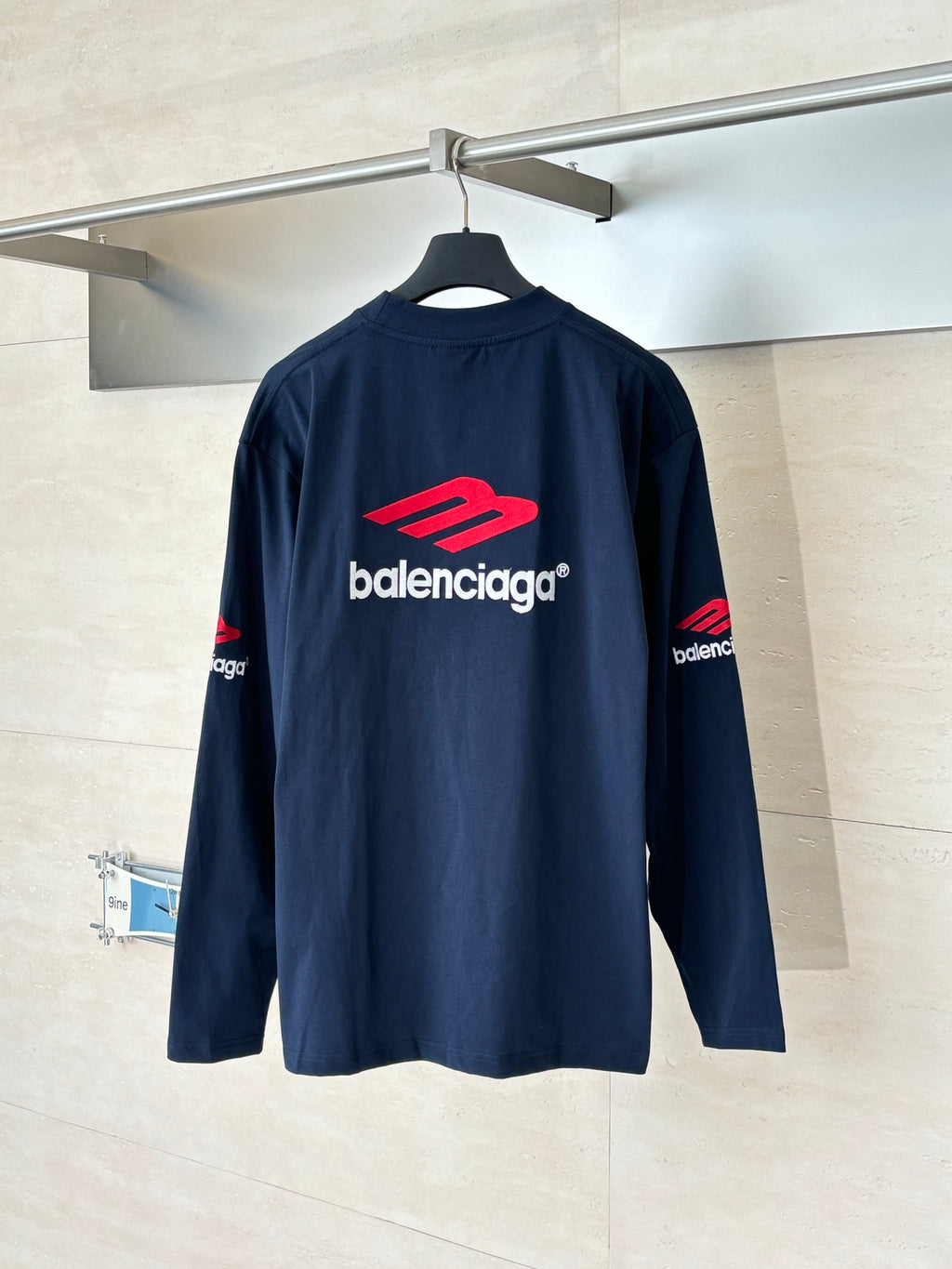 Navy long-sleeve T-shirt with Balenciaga logo and red graphic on back