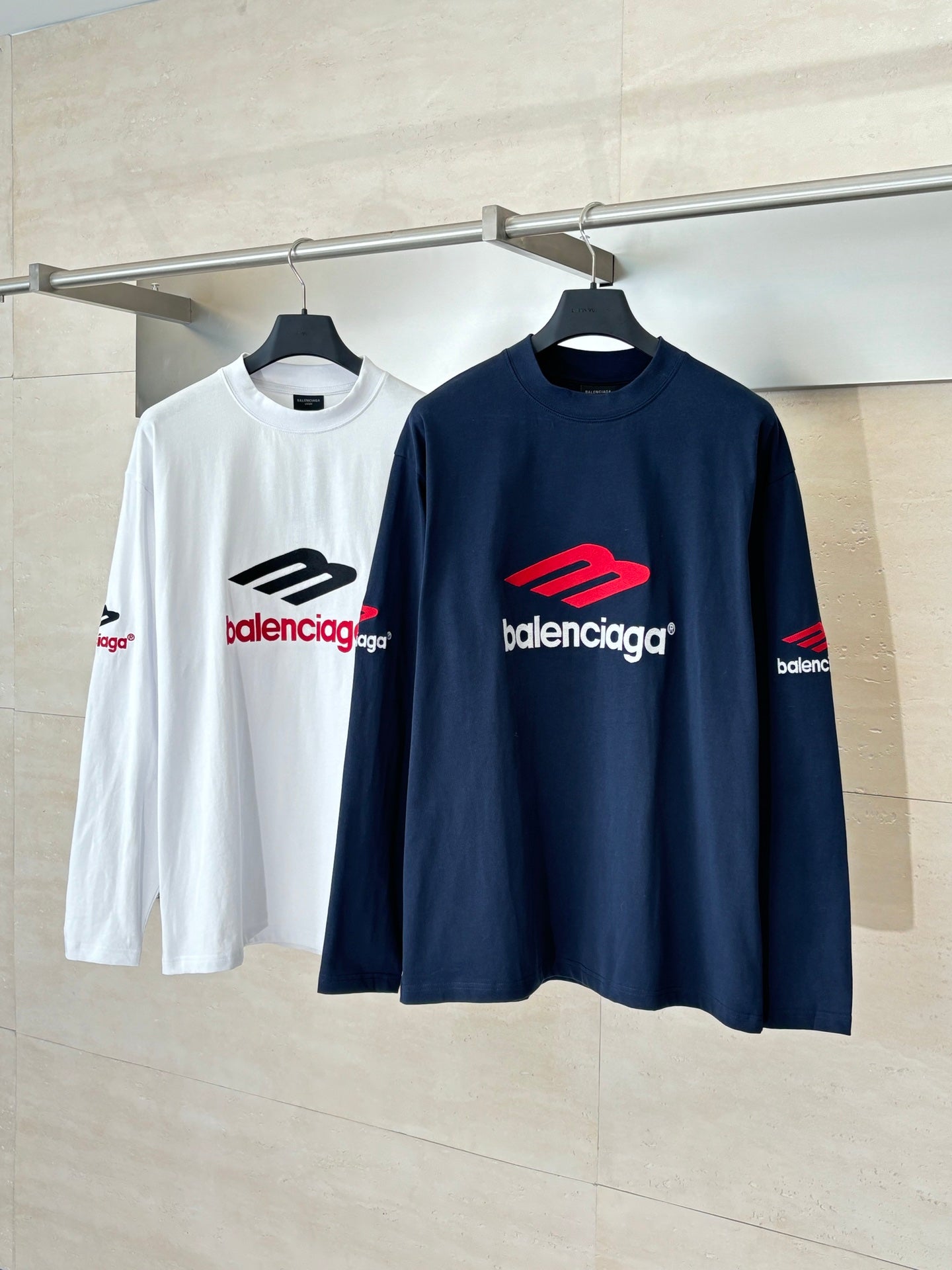 Pair of long-sleeve T-shirts, navy and white, with Balenciaga red logo