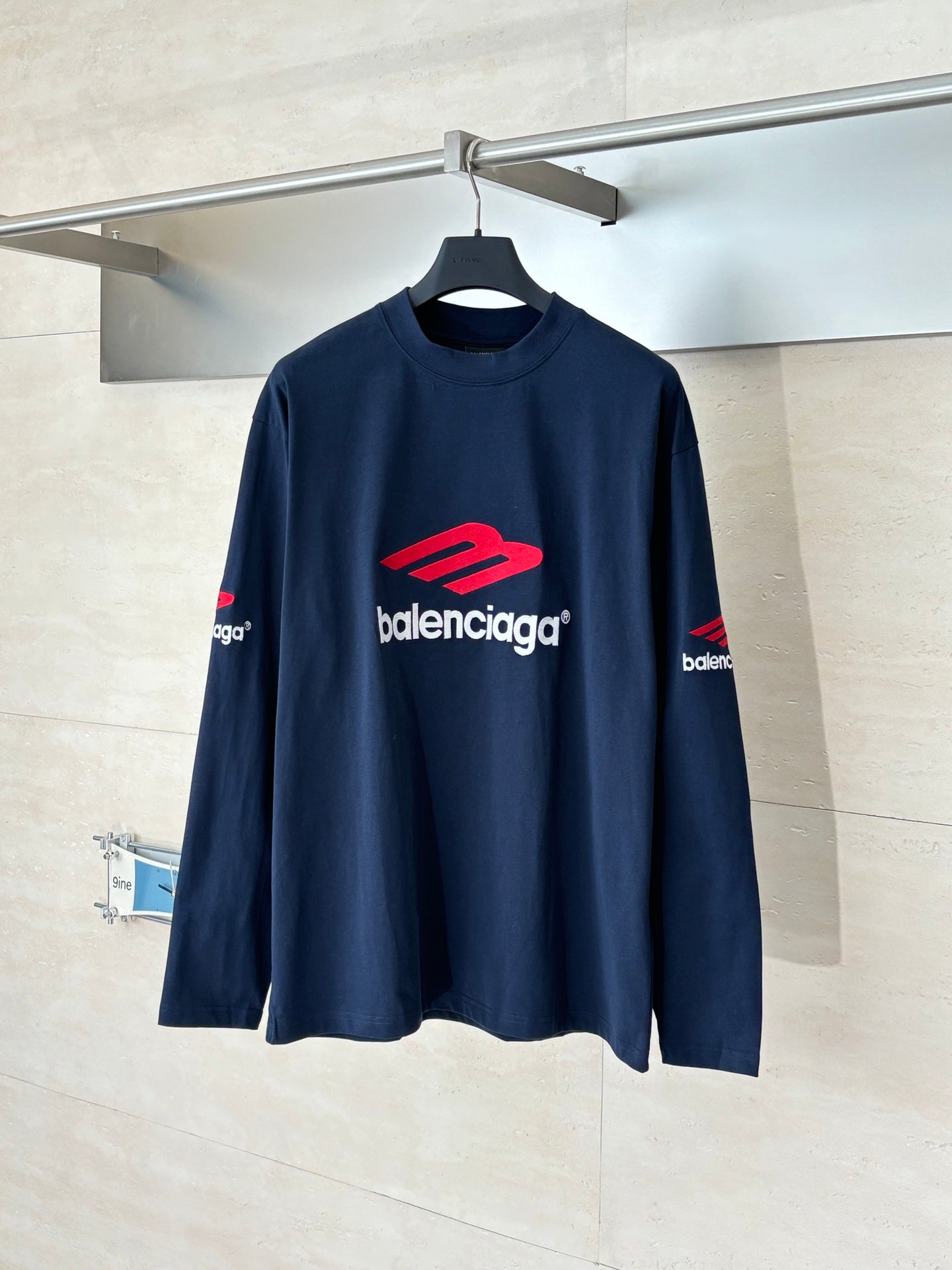 Navy long-sleeve T-shirt with Balenciaga logo and red graphic front