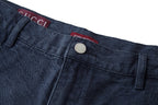 Gucci waistband closeup with silver button and Made in Italy tag