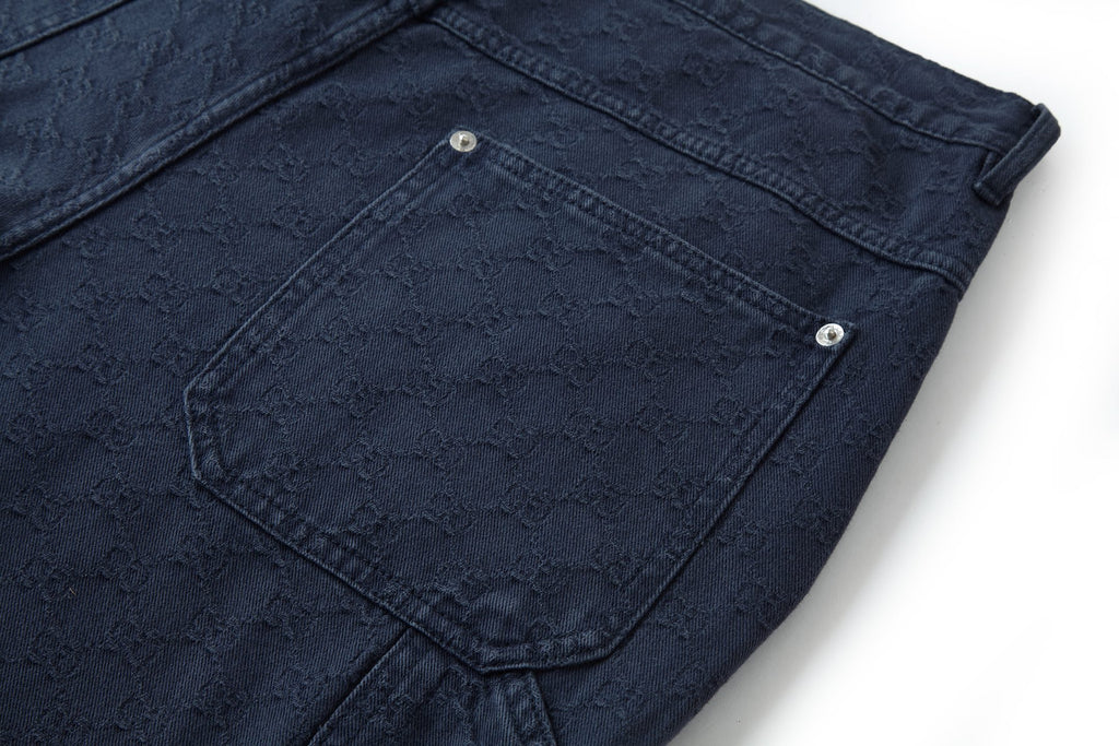 Navy wide-leg pants with large patch pocket and silver snap buttons