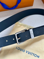 Louis Vuitton belt with silver rectangular buckle and embossed monogram strap, navy.