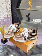 Women's Louis Vuitton low-top sneakers, pair on box, brown with white laces and monogram