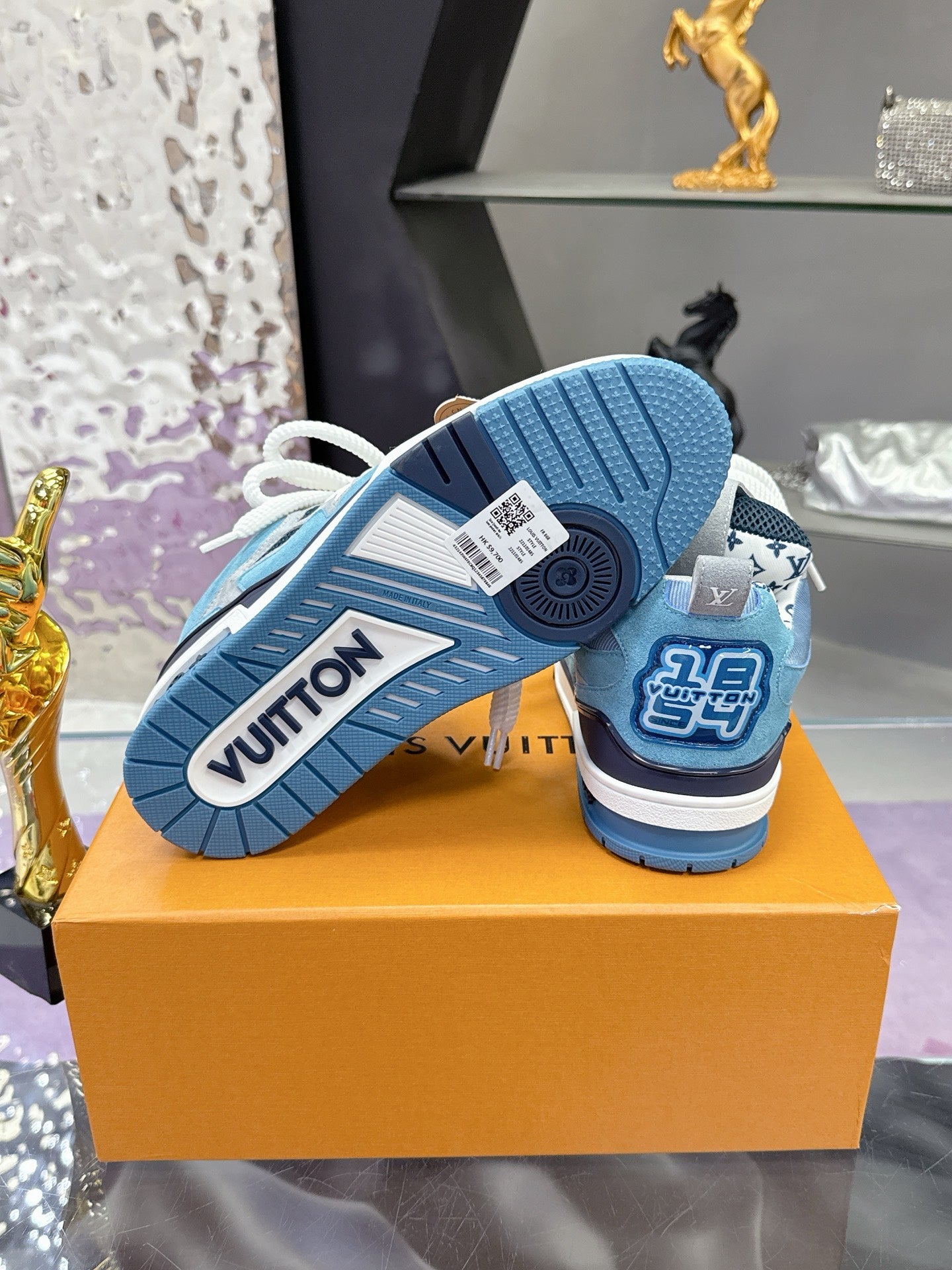Bottom view of blue Louis Vuitton women’s sneaker with V-shaped tread