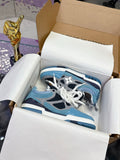 Blue Louis Vuitton women’s sneakers with white laces and black accents