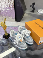 Louis Vuitton gray low-top sneakers with white laces and blue outsole