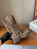 Suede ankle boot with front strap buckle and lug sole, taupe