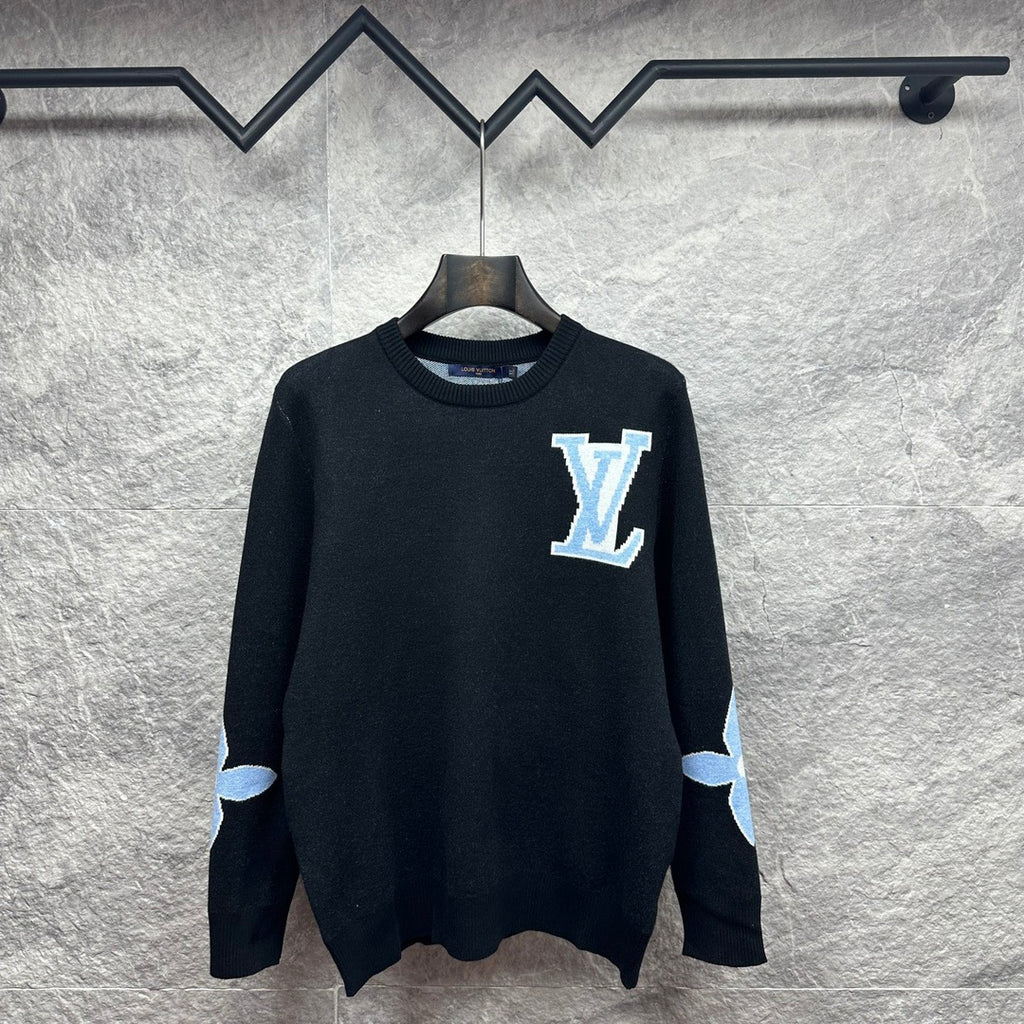 Dark navy crewneck sweater with Louis Vuitton monogram patch and light blue cuffs
