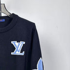 Louis Vuitton long-sleeve sweater with blue LV star logo at upper chest
