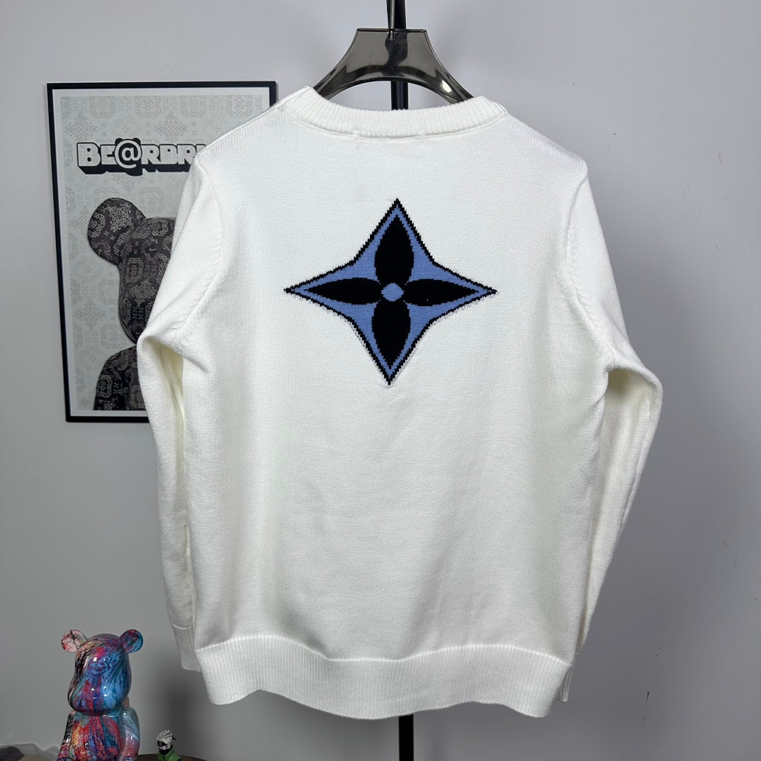 Back view long-sleeve knit sweater in white with large blue star logo
