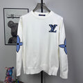 Long-sleeve knit sweater in white with blue logo motif on chest and sleeves