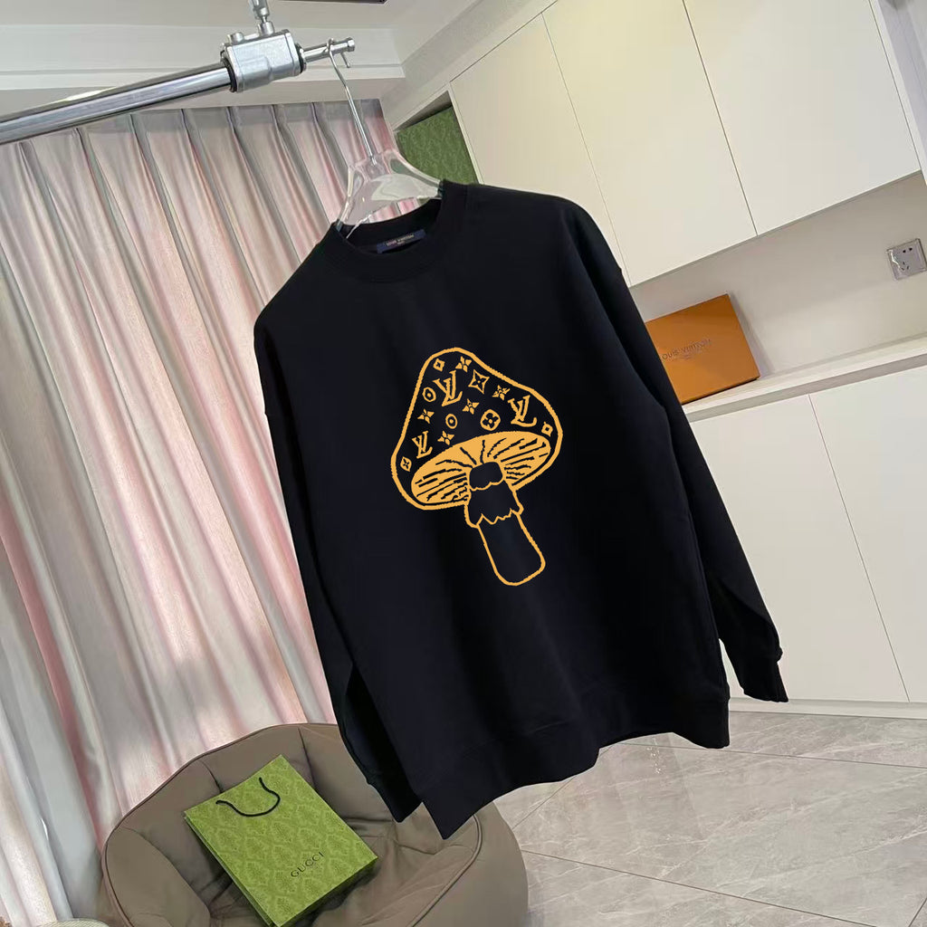 Black long-sleeve crewneck sweatshirt with yellow graphic emblem on front