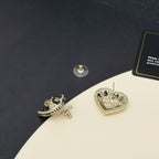 Heart stud earrings with rhinestone edge and engraved crown-style center