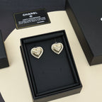 Heart stud earrings in a gift box, silver-tone with rhinestone heart frame