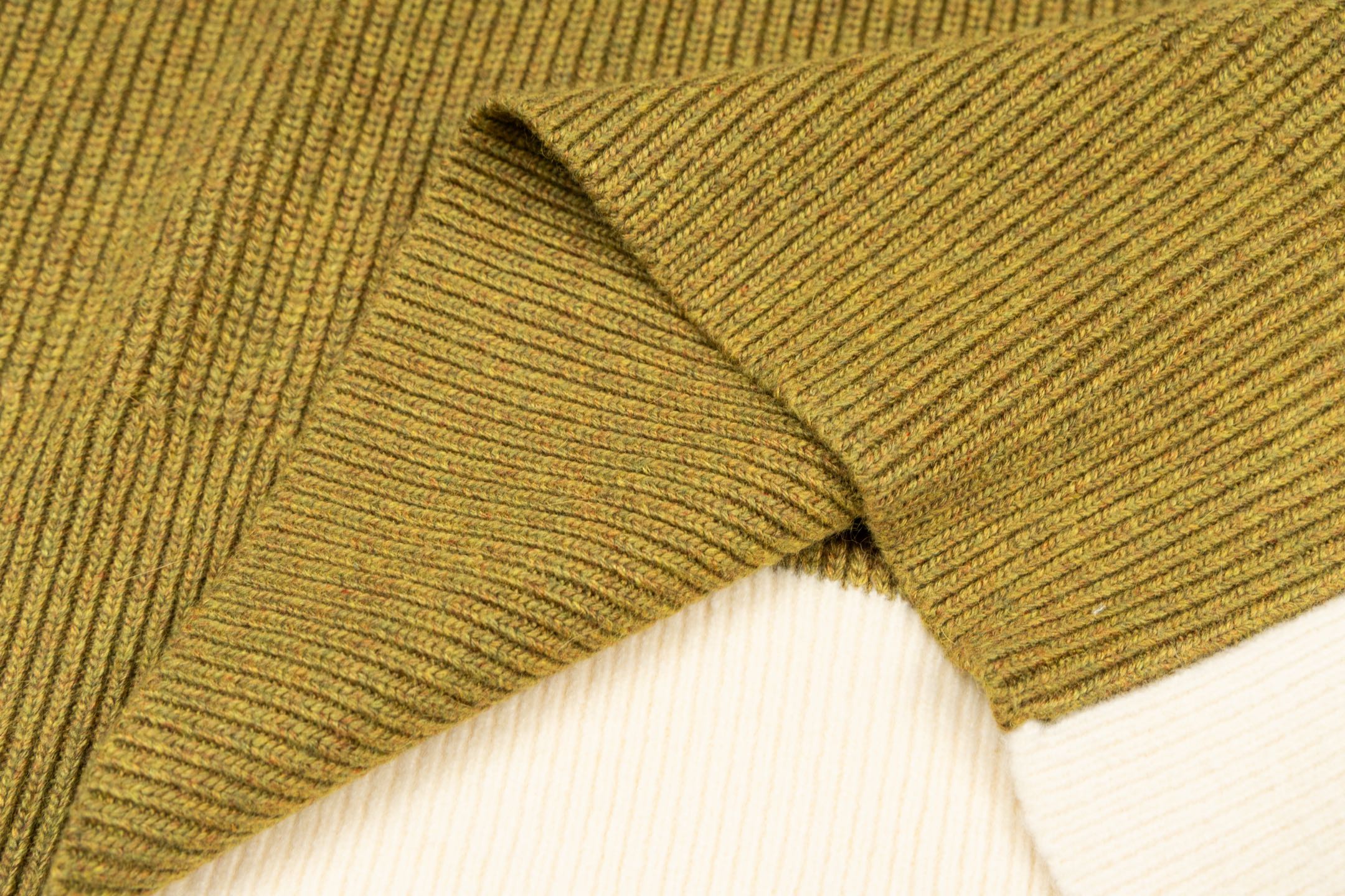 Amiri knit sweater, mustard-green ribbed fabric with seam detail near neckline