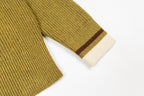 Olive knit cardigan sleeve with brown and white stripe accents