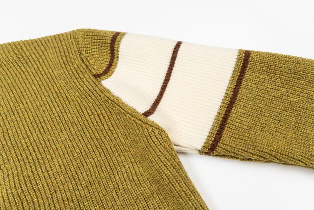 Olive cardigan collar with brown trim and white striped sleeve hem