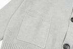 Light gray knit cardigan with chest patch pockets and front button detail