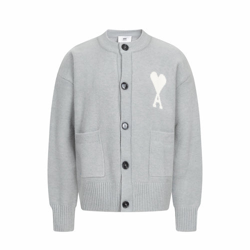 Light gray knit cardigan with button front and white heart logo with letter A
