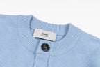 Amiri light blue knit cardigan neckline with button placket and brand tag