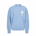 Amiri light blue crewneck sweater with heart-and-X logo