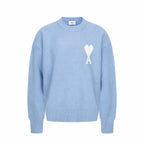 Amiri light blue crewneck sweater with heart-and-X logo