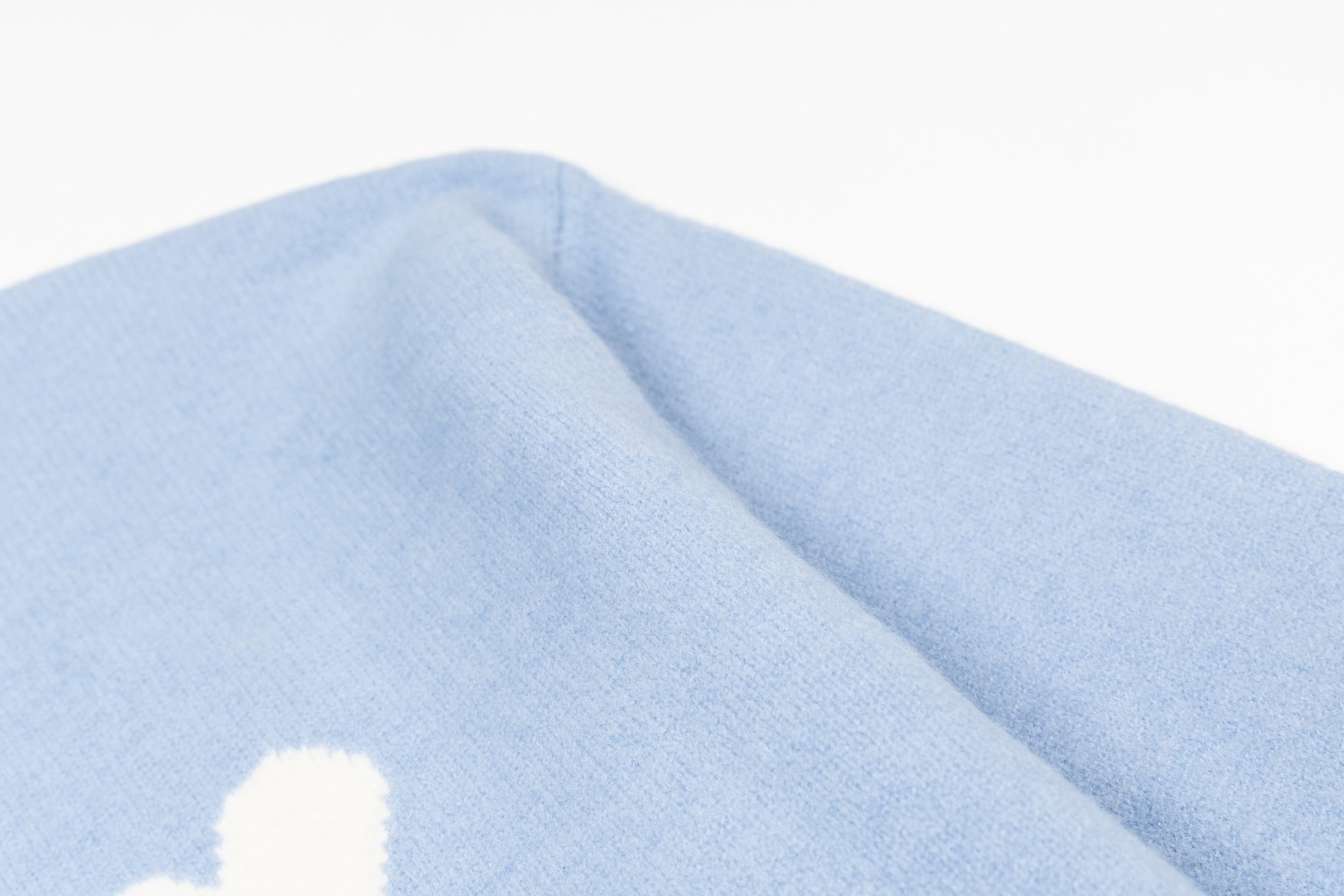 Amiri light blue sweater with sleeve seam and soft knit texture