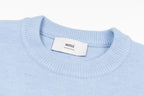 Amiri light blue crewneck sweater with visible neck label