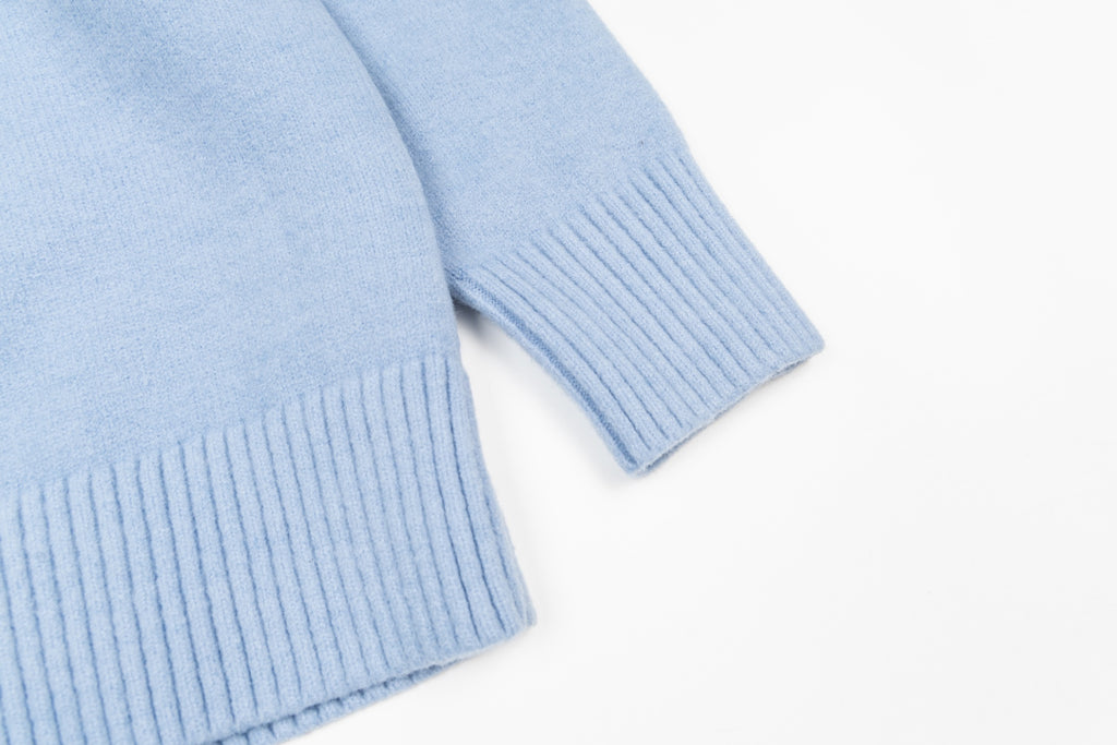 Amiri light blue sweater hem and ribbed cuffs