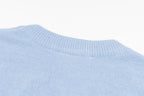 Amiri light blue crewneck sweater with ribbed collar and knit texture