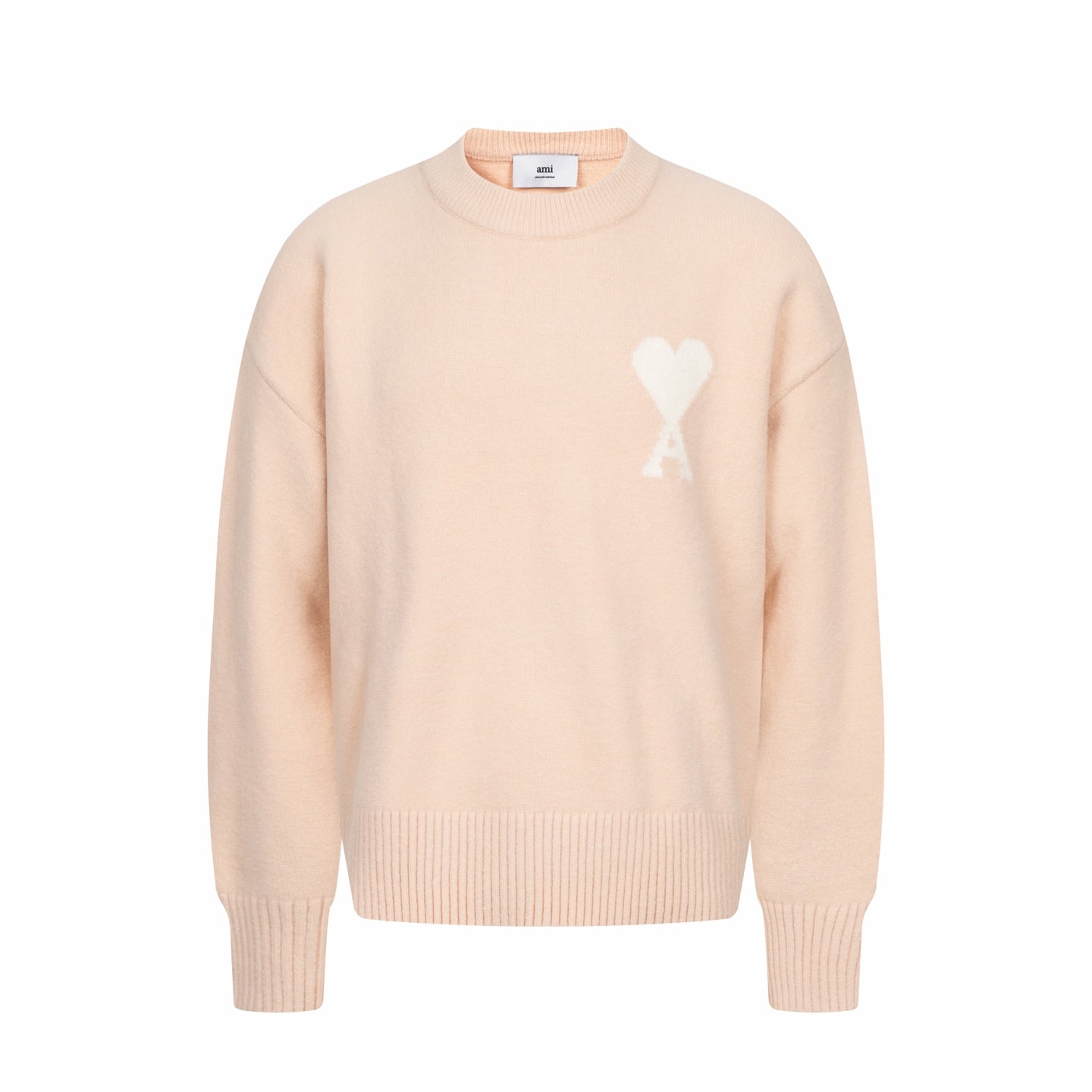 Light pink crewneck sweater with ribbed cuffs and hem, featuring a white heart logo