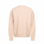Amiri cardigan in light peach, crew neck, with ribbed cuffs and ribbed hem