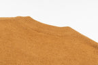 Camel brown crewneck sweater with smooth knit texture