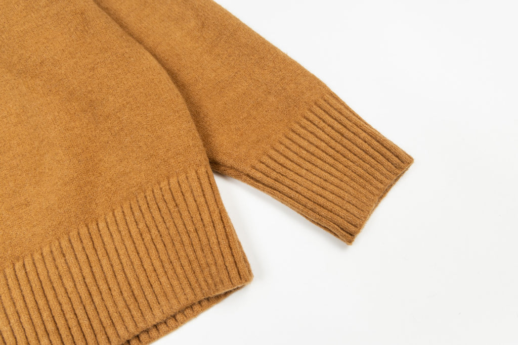 Camel brown crewneck sweater with ribbed cuffs and hem